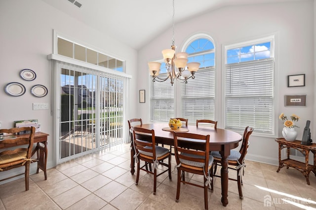 1 Jester Ct, Monroe, NJ 08831 - dining area featuring lofted ceiling, a chandelier, light tile patterned floors, and baseboards
