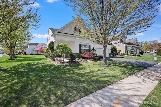 1 Jester Ct, Monroe, NJ 08831 - view of home's exterior with driveway, a lawn, an attached garage, and a residential view
