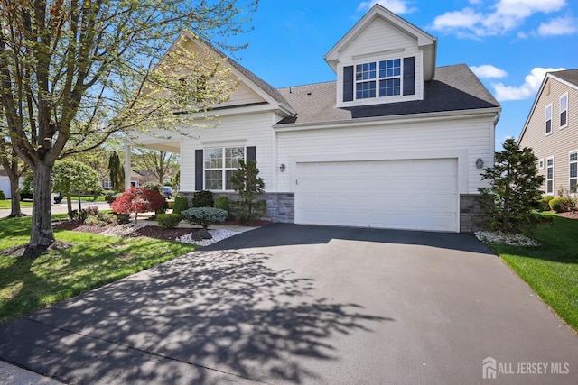 1 Jester Ct, Monroe, NJ 08831 - view of front of home with stone siding, asphalt driveway, roof with shingles, and a front lawn
