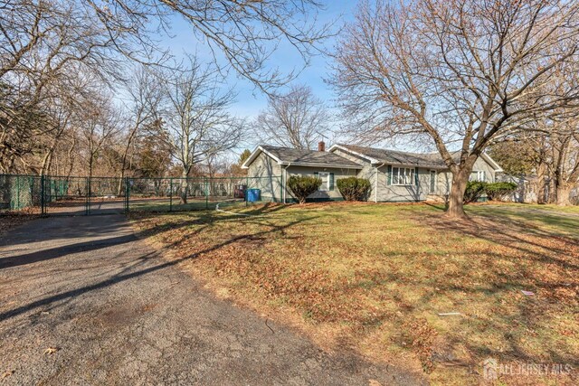 view of front of home with a front yard