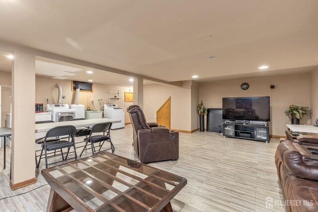 living room with separate washer and dryer