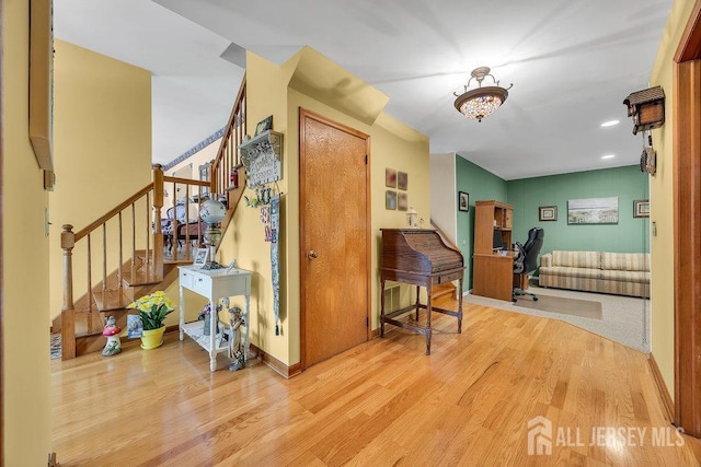 4 Anne Ter, South Amboy, NJ 08879 - entryway with wood finished floors, stairway, baseboards, and a chandelier