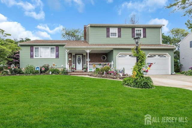 4 Anne Ter, South Amboy, NJ 08879 - tri-level home with driveway, a garage, a front yard, and covered porch
