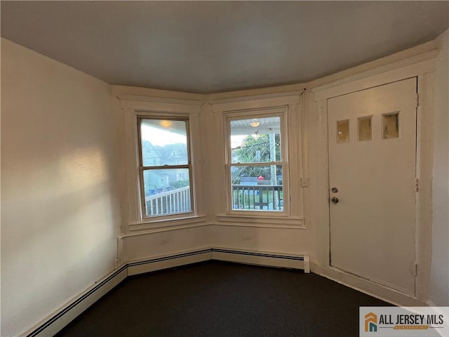 425 John St, Plainfield, NJ 07060 - foyer entrance with a baseboard heating unit