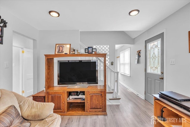 218 Winthrop Ave, Moorestown, NJ 08057 - living area with light wood finished floors, vaulted ceiling, and baseboards