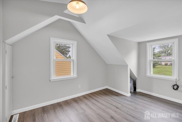 218 Winthrop Ave, Moorestown, NJ 08057 - additional living space with wood finished floors, lofted ceiling, and baseboards