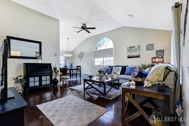 living room featuring high vaulted ceiling, dark hardwood / wood-style flooring, ceiling fan with notable chandelier, and a textured ceiling