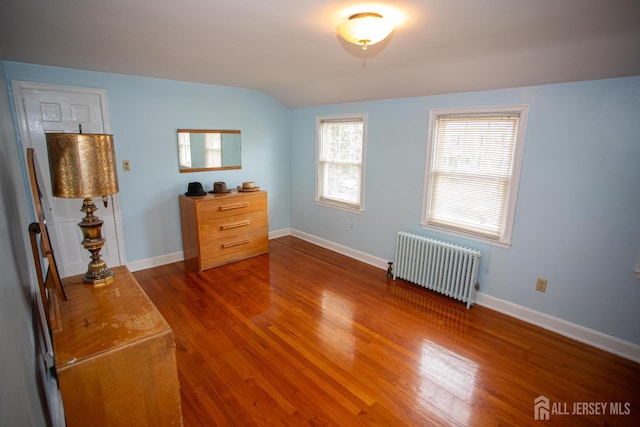 25 S Edward St S, Sayreville, NJ 08872 - bedroom with radiator, wood finished floors, and baseboards