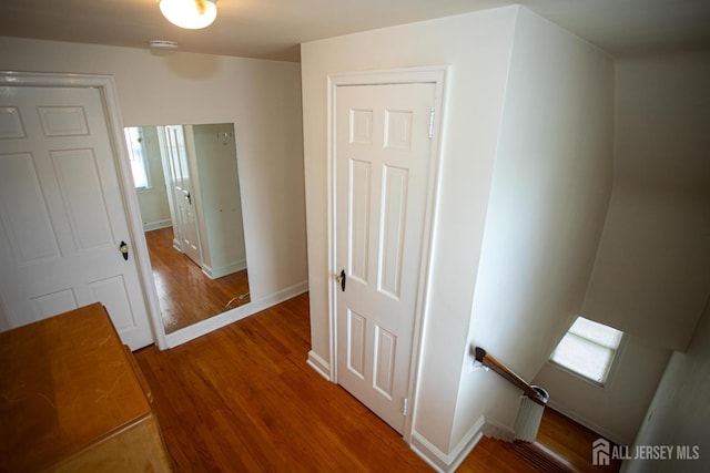 25 S Edward St S, Sayreville, NJ 08872 - hallway featuring an upstairs landing, wood finished floors, and baseboards