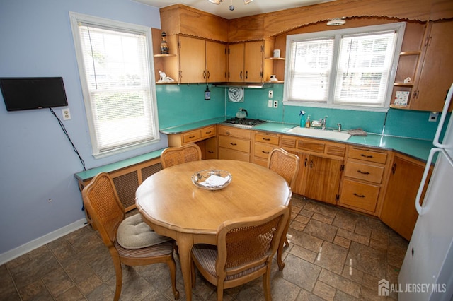 25 S Edward St S, Sayreville, NJ 08872 - kitchen featuring open shelves, a sink, stone tile flooring, and plenty of natural light