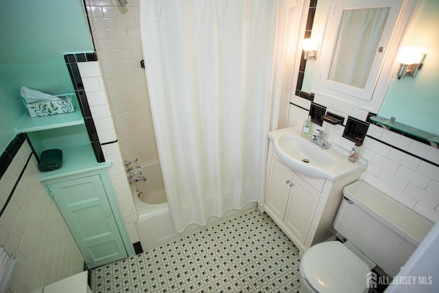 25 S Edward St S, Sayreville, NJ 08872 - full bath with toilet, vanity, shower / bath combo, and tile walls