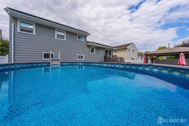 outdoor pool with a gazebo