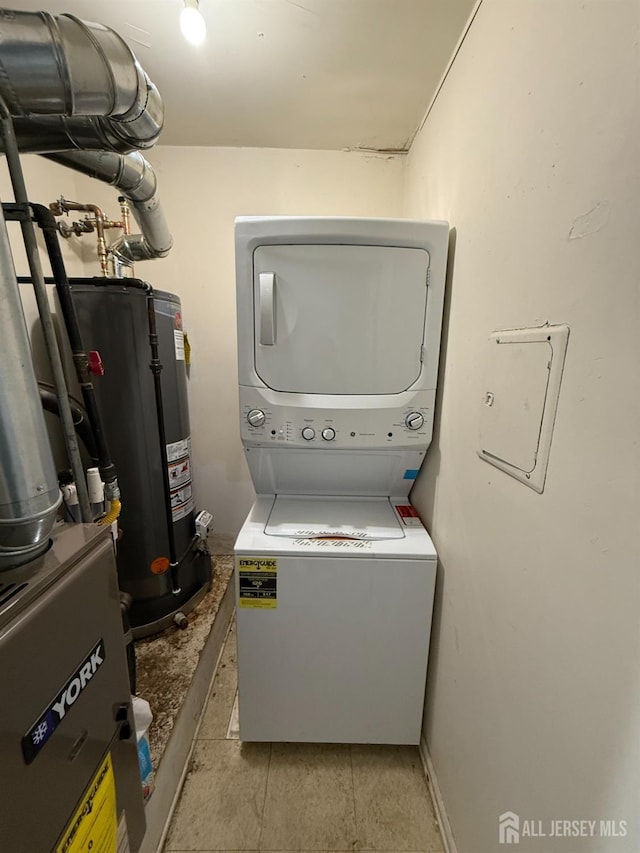 104 Morgan Pl E, Brunswick, NJ 08816 - washroom with estacked washer and dryer and gas water heater