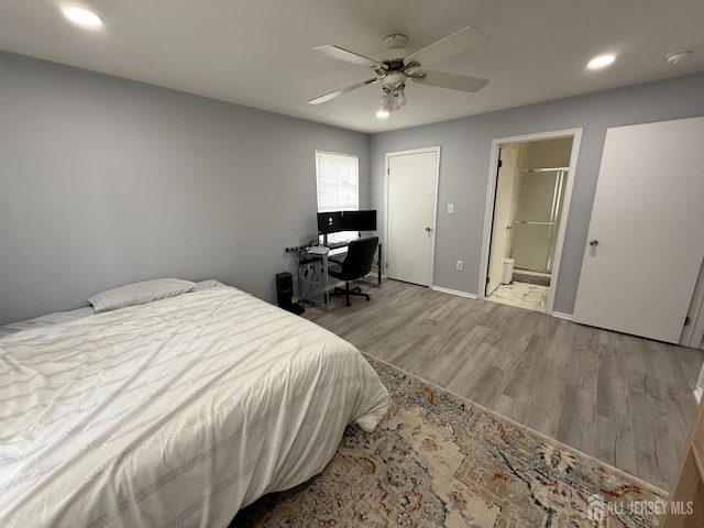 104 Morgan Pl E, Brunswick, NJ 08816 - bedroom with wood finished floors, recessed lighting, ceiling fan, ensuite bath, and baseboards