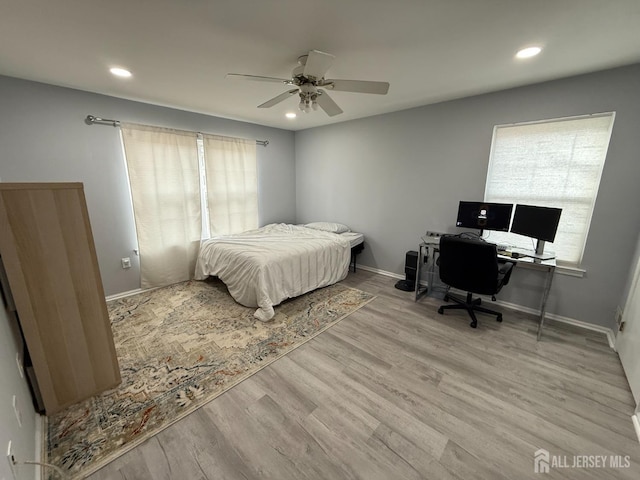 104 Morgan Pl E, Brunswick, NJ 08816 - bedroom featuring recessed lighting, wood finished floors, baseboards, ceiling fan, and an office area