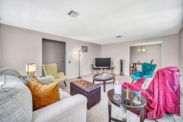 312 Sharon Way Unit 312N, Monroe, NJ 08831 - living area featuring carpet flooring, a textured ceiling, and baseboards