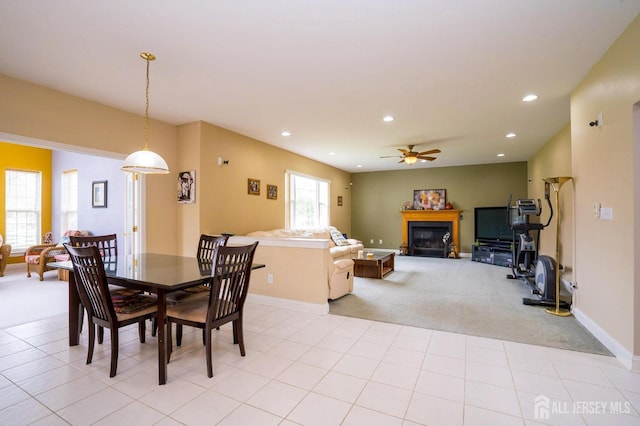 4 Cottonwood Ct, Plainsboro, NJ 08536 - dining area featuring light colored carpet, a ceiling fan, a glass covered fireplace, recessed lighting, and baseboards