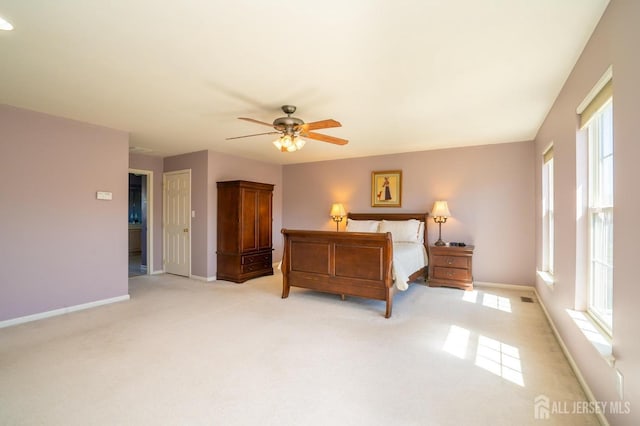 4 Cottonwood Ct, Plainsboro, NJ 08536 - bedroom featuring baseboards, light carpet, and ceiling fan