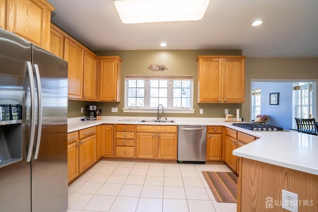 4 Cottonwood Ct, Plainsboro, NJ 08536 - kitchen featuring appliances with stainless steel finishes, a sink, a peninsula, plenty of natural light, and recessed lighting