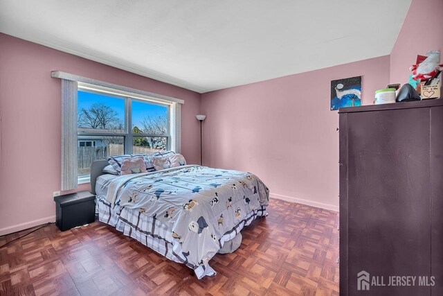 bedroom with baseboards