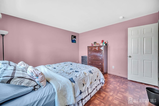 bedroom with baseboards