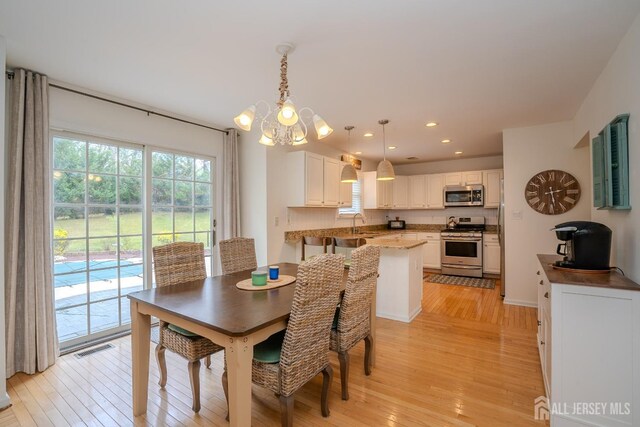 3 Clark Ct, Monroe, NJ 08831 - dining room with light wood-style flooring, visible vents, recessed lighting, and a notable chandelier