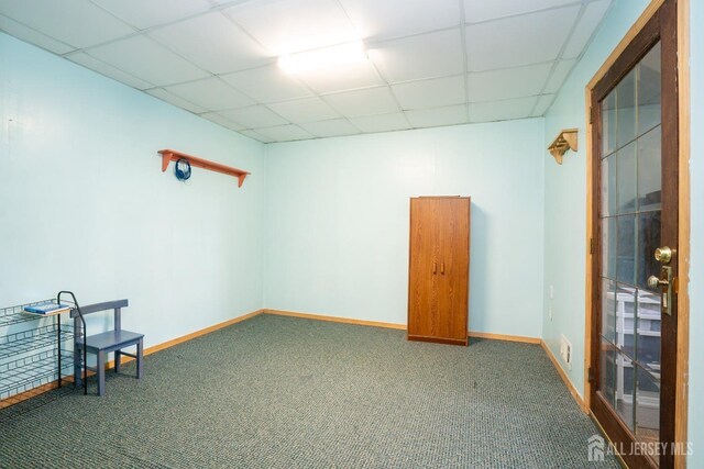 3 Clark Ct, Monroe, NJ 08831 - empty room with baseboards, a paneled ceiling, and carpet