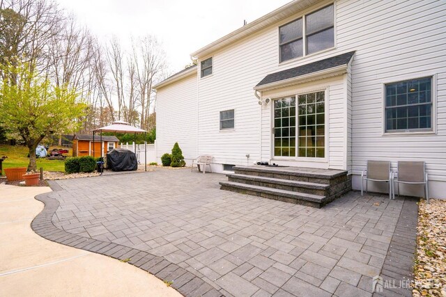 3 Clark Ct, Monroe, NJ 08831 - back of house featuring a patio area