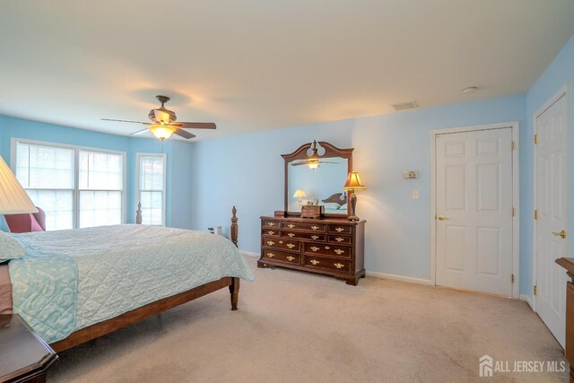 3 Clark Ct, Monroe, NJ 08831 - bedroom featuring visible vents, a ceiling fan, baseboards, and light carpet
