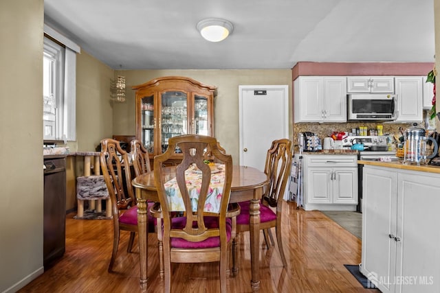 dining room featuring light wood-style flooring