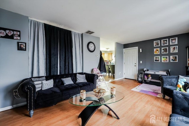 living room with hardwood / wood-style floors