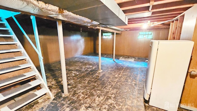 basement with freestanding refrigerator
