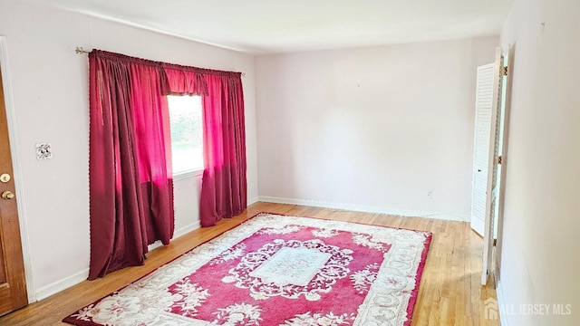 empty room featuring wood finished floors