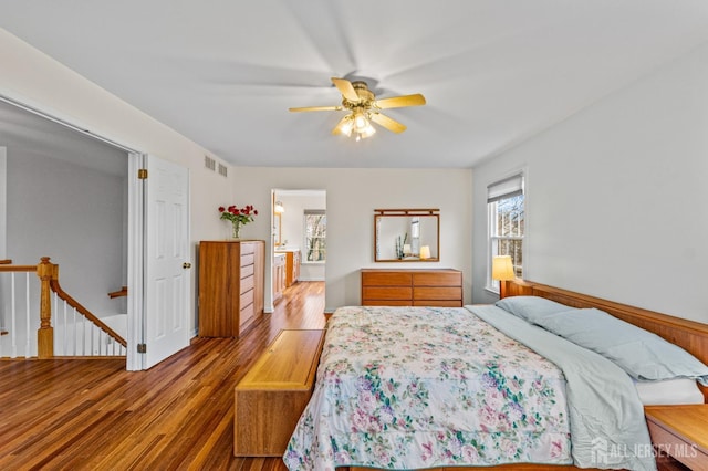 bedroom featuring ceiling fan and light wood-type flooring