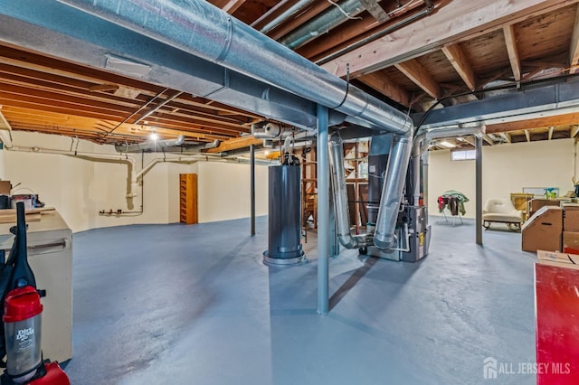 basement with heating unit and gas water heater