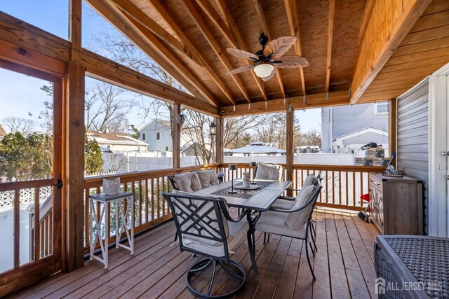 snow covered deck with ceiling fan