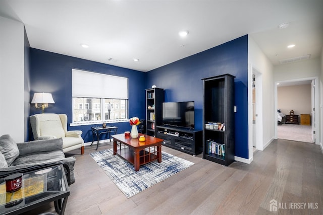 living room featuring hardwood / wood-style floors