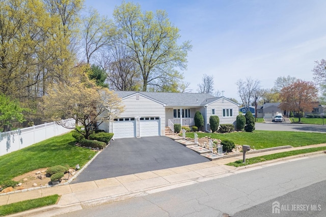 199 N Brook Dr N, Milltown, NJ 08850 - ranch-style house with an attached garage, asphalt driveway, and a porch