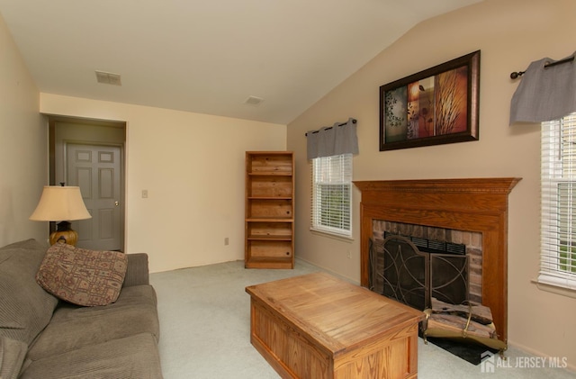 71 S Sagamore Ave, Edison, NJ 08820 - living room featuring light carpet, lofted ceiling, and a brick fireplace