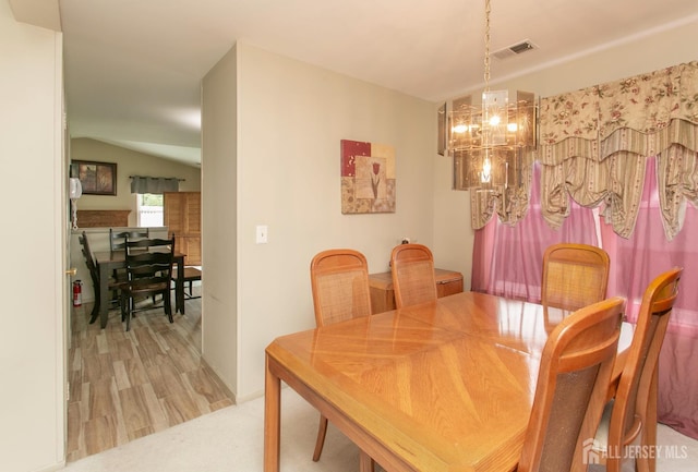 71 S Sagamore Ave, Edison, NJ 08820 - dining room with lofted ceiling and light wood-style floors