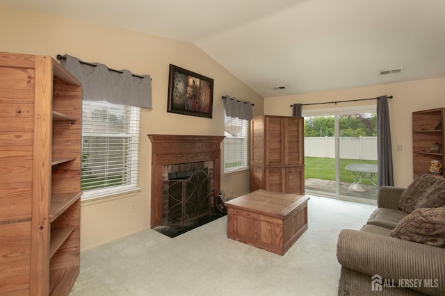 71 S Sagamore Ave, Edison, NJ 08820 - carpeted living room with lofted ceiling and a fireplace with flush hearth