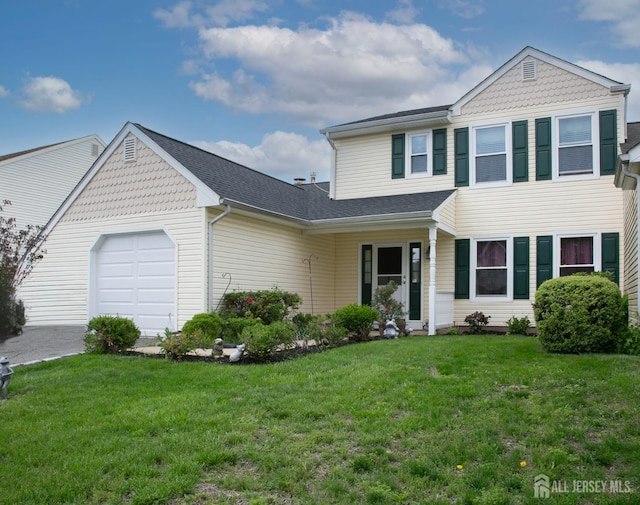 71 S Sagamore Ave, Edison, NJ 08820 - view of front of property featuring an attached garage and a front yard