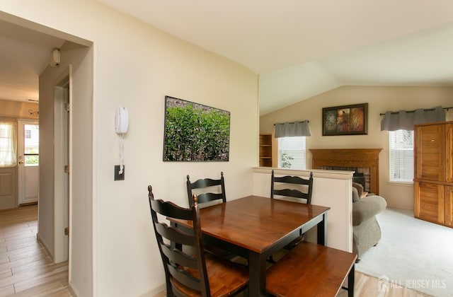 71 S Sagamore Ave, Edison, NJ 08820 - dining space featuring healthy amount of natural light, vaulted ceiling, and baseboards