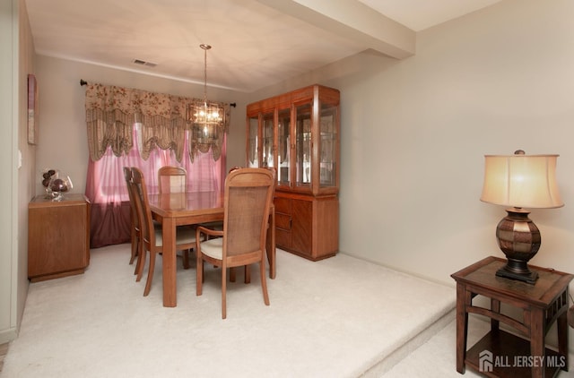 71 S Sagamore Ave, Edison, NJ 08820 - dining room featuring carpet flooring and a chandelier