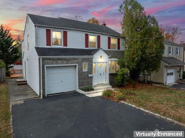 view of front of home featuring a garage