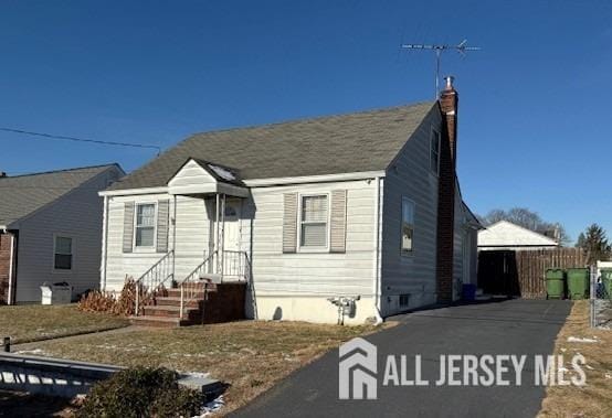 158 Liberty St, Sayreville, NJ 08879 - bungalow-style home featuring a chimney