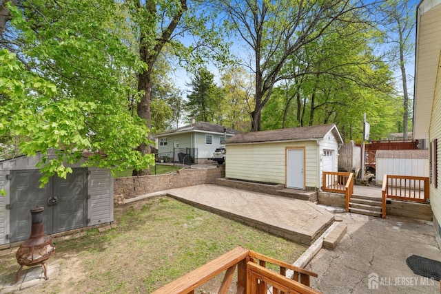 9 Hatakawana Ter, Mount Olive, NJ 07828 - view of yard featuring a patio area and a deck