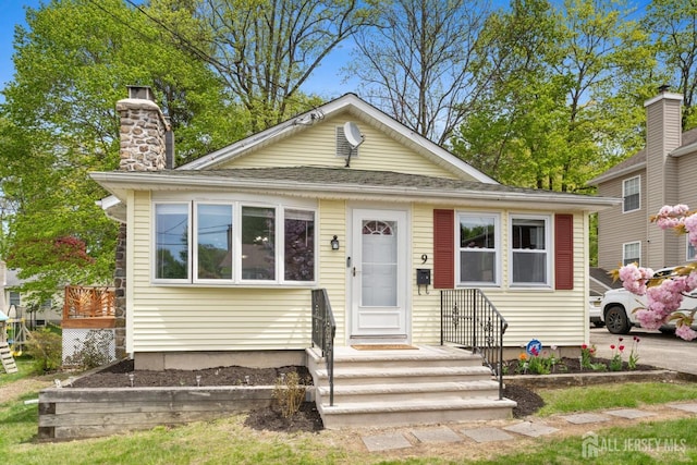 9 Hatakawana Ter, Mount Olive, NJ 07828 - bungalow-style house with a chimney and roof with shingles