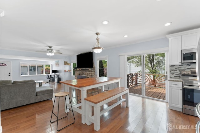9 Hatakawana Ter, Mount Olive, NJ 07828 - kitchen with stainless steel appliances, ceiling fan, white cabinets, tasteful backsplash, and recessed lighting