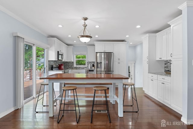 9 Hatakawana Ter, Mount Olive, NJ 07828 - kitchen featuring stainless steel appliances, backsplash, recessed lighting, white cabinets, and decorative light fixtures